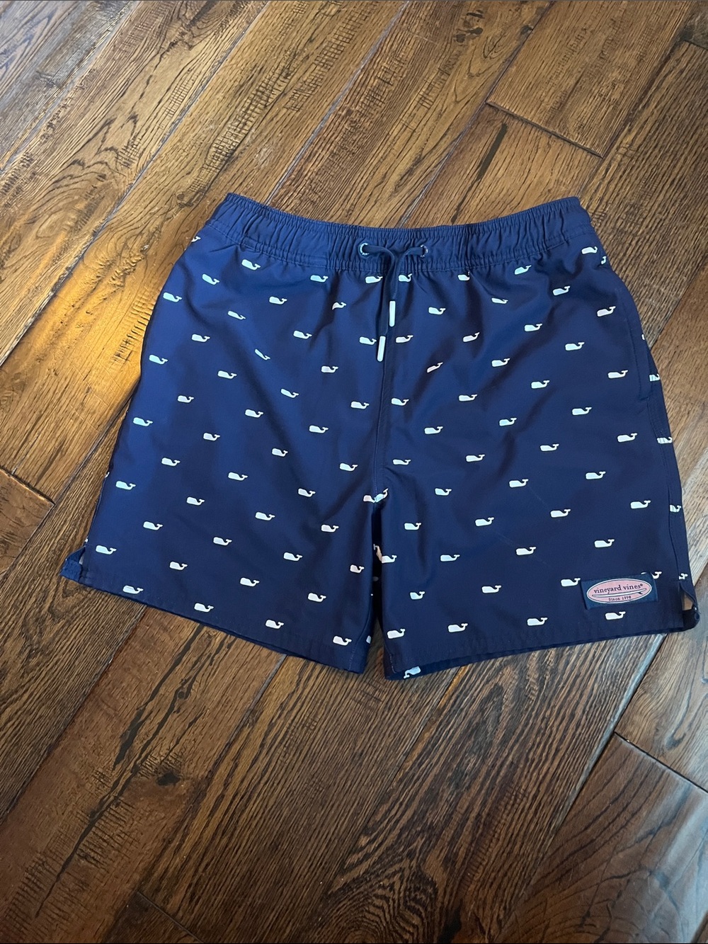 Vineyard Vines Navy Swim Trunks with Light Blue Whale Print